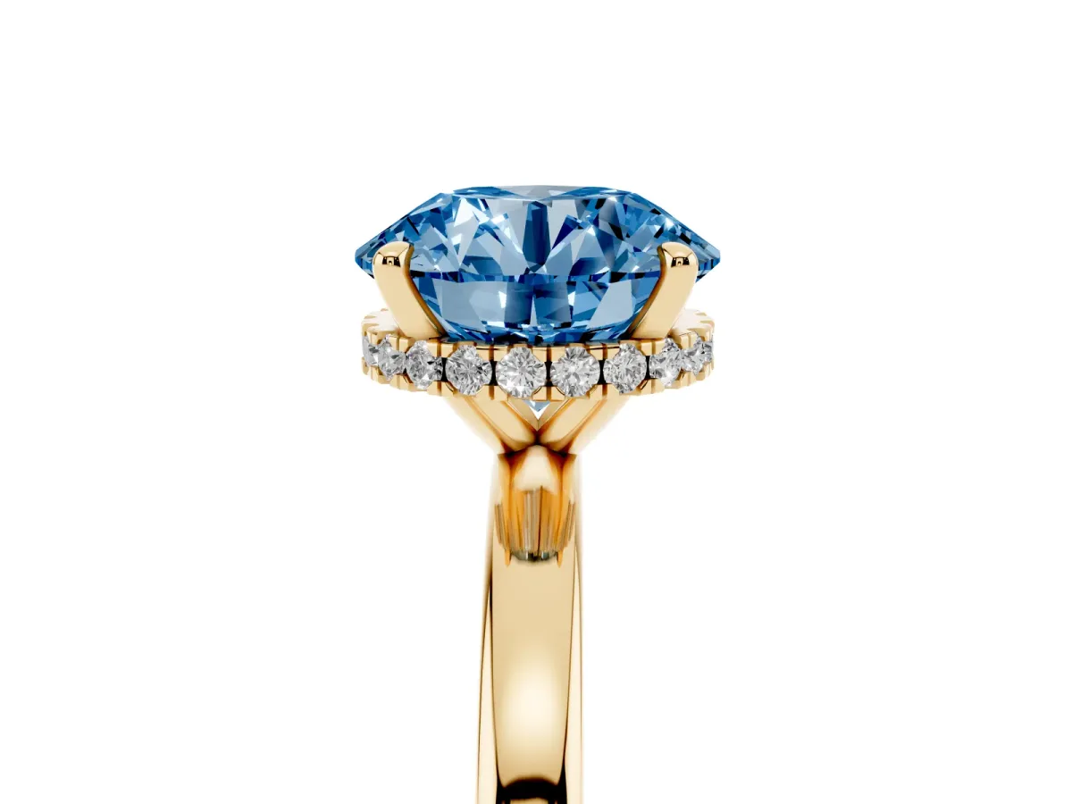 Fancy Blue Round Cut Solitaire Engagement Ring with Cathedral Band and Four-Prong Setting Yellow gold