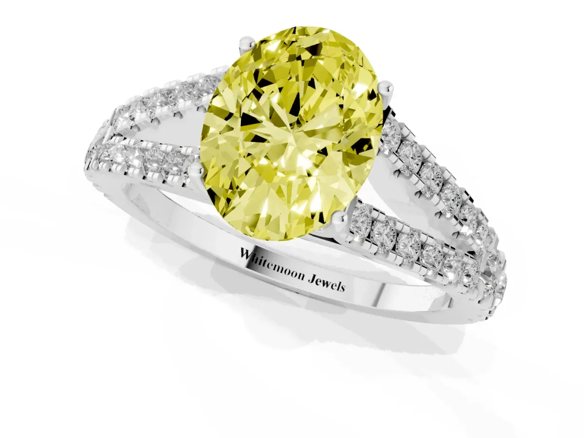 Fancy Yellow Oval Cut Diamond Split Shank Pavé Engagement Ring with Four-Prong Setting White gold