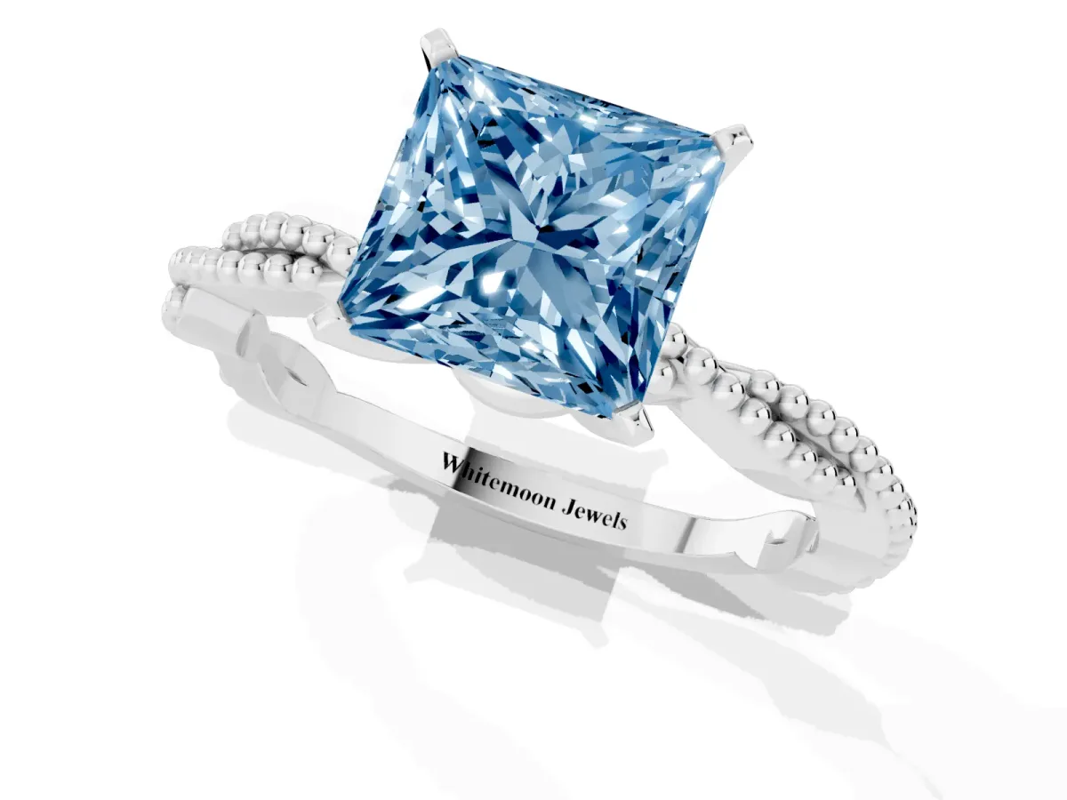 Fancy Blue Princess Cut Solitaire Twisted Band with Bead Prong Setting Silver