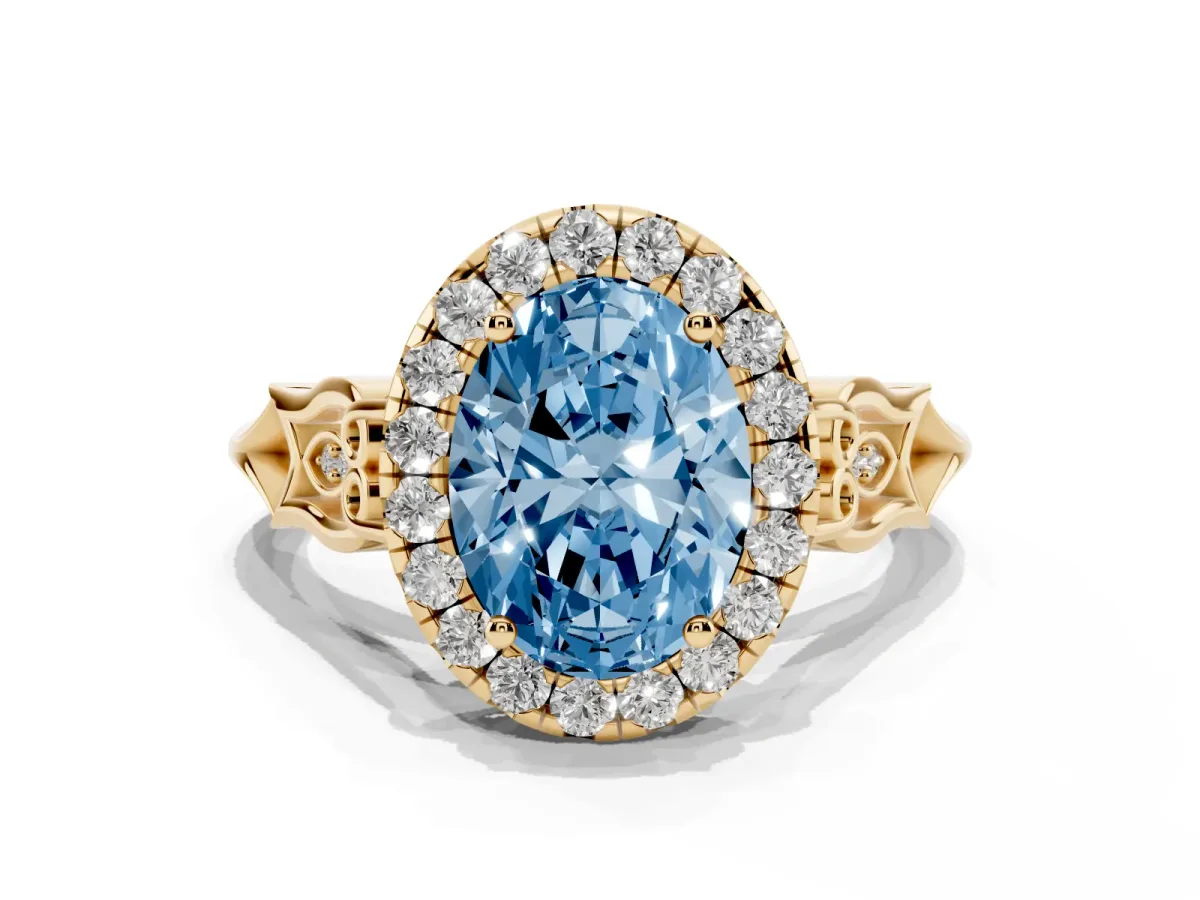 Fancy Blue Oval Cut Halo Diamond Engagement Ring with Filigree Band and Four-Prong Setting Yellow gold