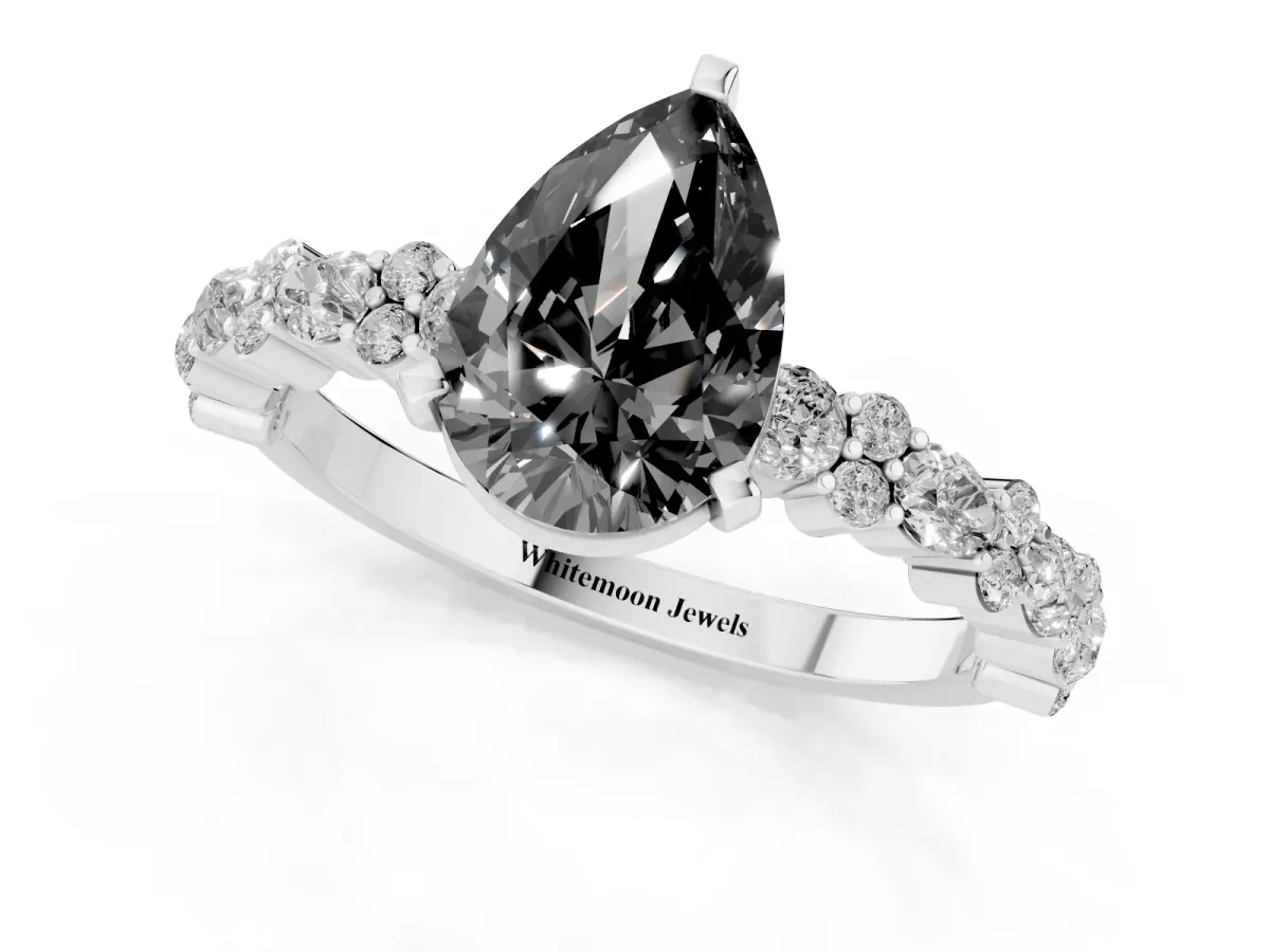 Fancy Black Pear Cut Diamond Side Stone Solitaire Ring with Round and Four-Prong Setting Platinum