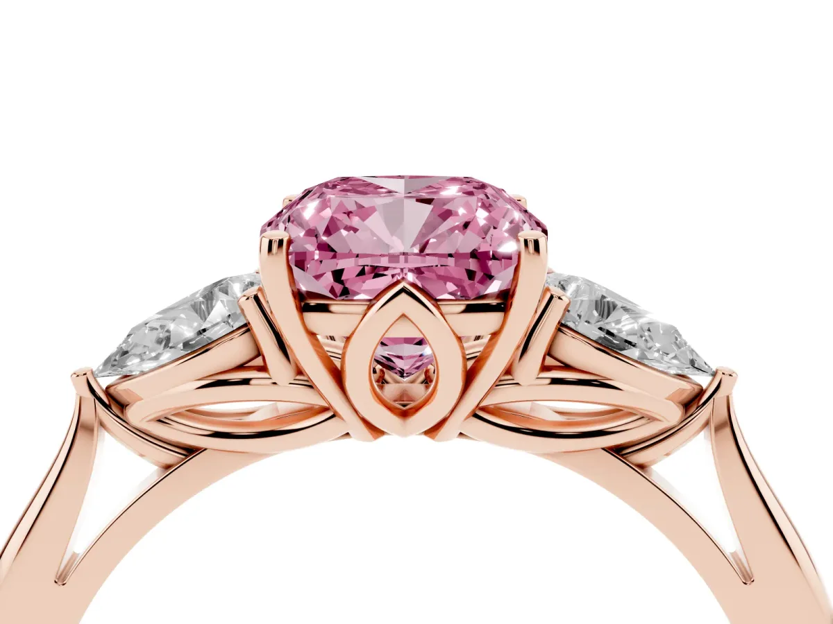 Fancy Pink Three-Stone Cushion Cut Diamond Ring with Pear Side Stones in Four-Prong Setting Rose gold