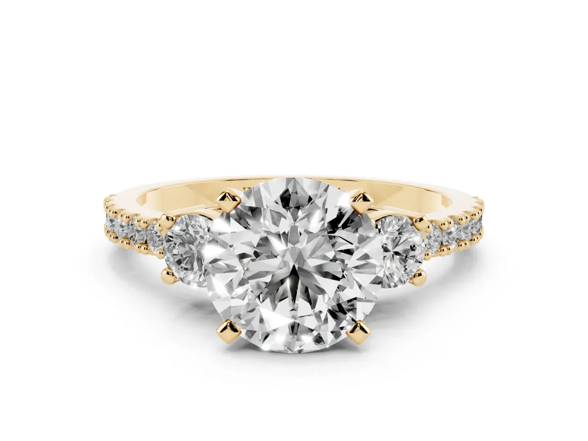 Round Cut Three-Stone Diamond Pavé Band with Prong Setting Yellow gold