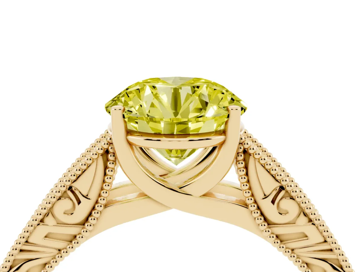 Fancy Yellow Round Cut Diamond Solitaire Ring with Engraved Band and Four-Prong Setting Yellow gold