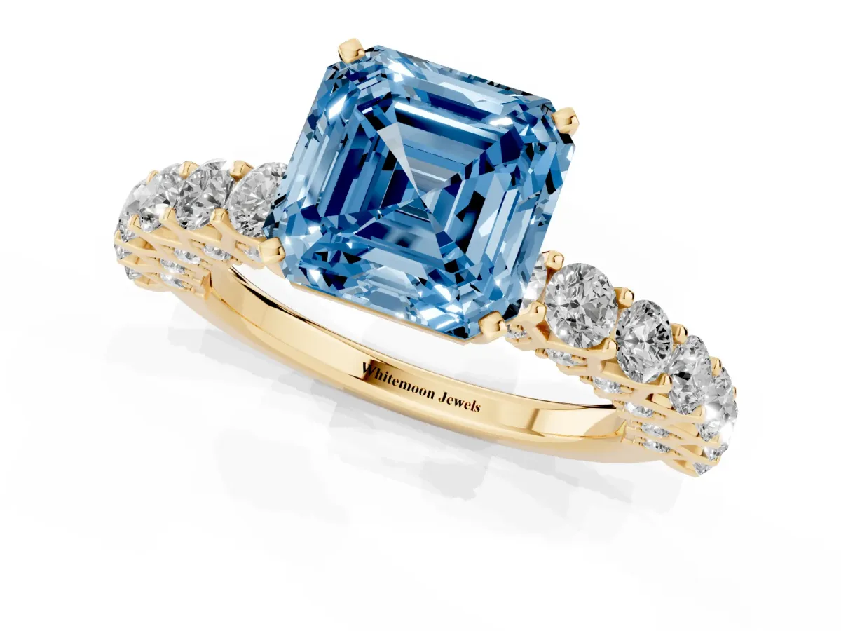 Fancy Blue Asscher Cut Diamond Solitaire Ring with Shared Prong Pavé Band and Four-Prong Setting Yellow gold