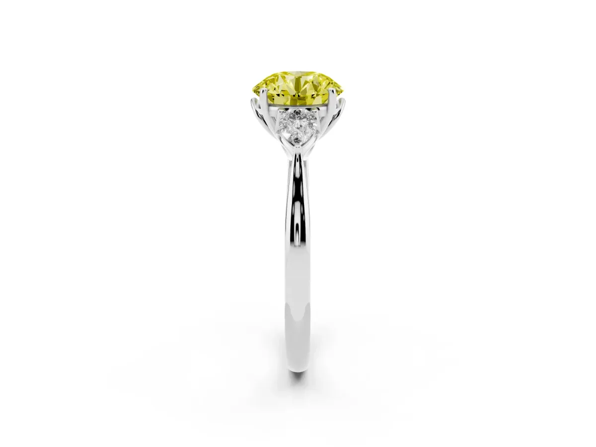 Fancy Yellow Three-Stone Round Cut Brilliant Diamond Solitaire Ring with Tapered Band and Four-Prong Setting Silver