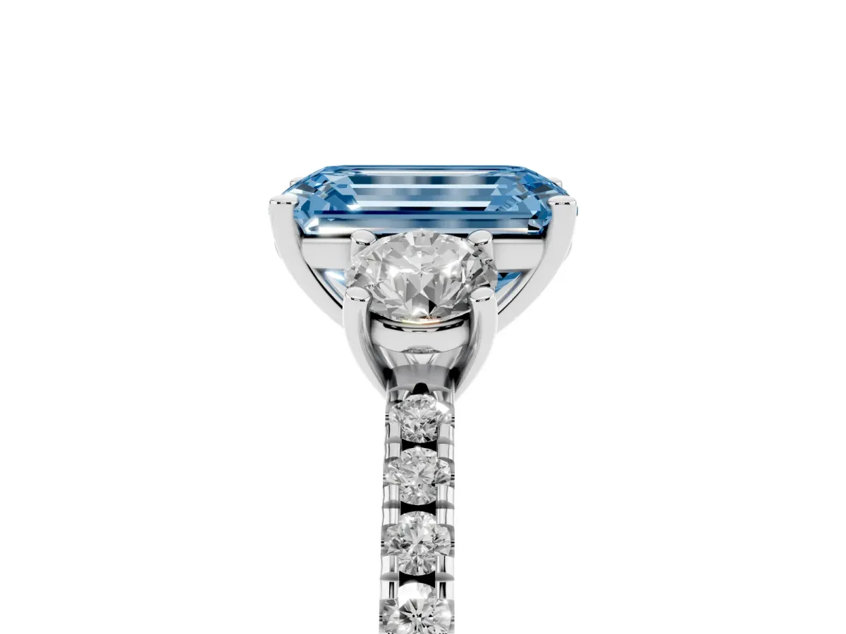 Fancy Blue Three-Stone Emerald Cut Cut Diamond Pavé Band with Prong Setting Platinum