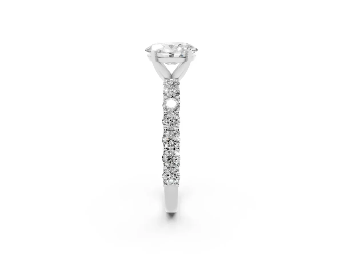 Oval Cut Diamond Solitaire Ring with Shared Prong Pavé Band and Four-Prong Setting Silver