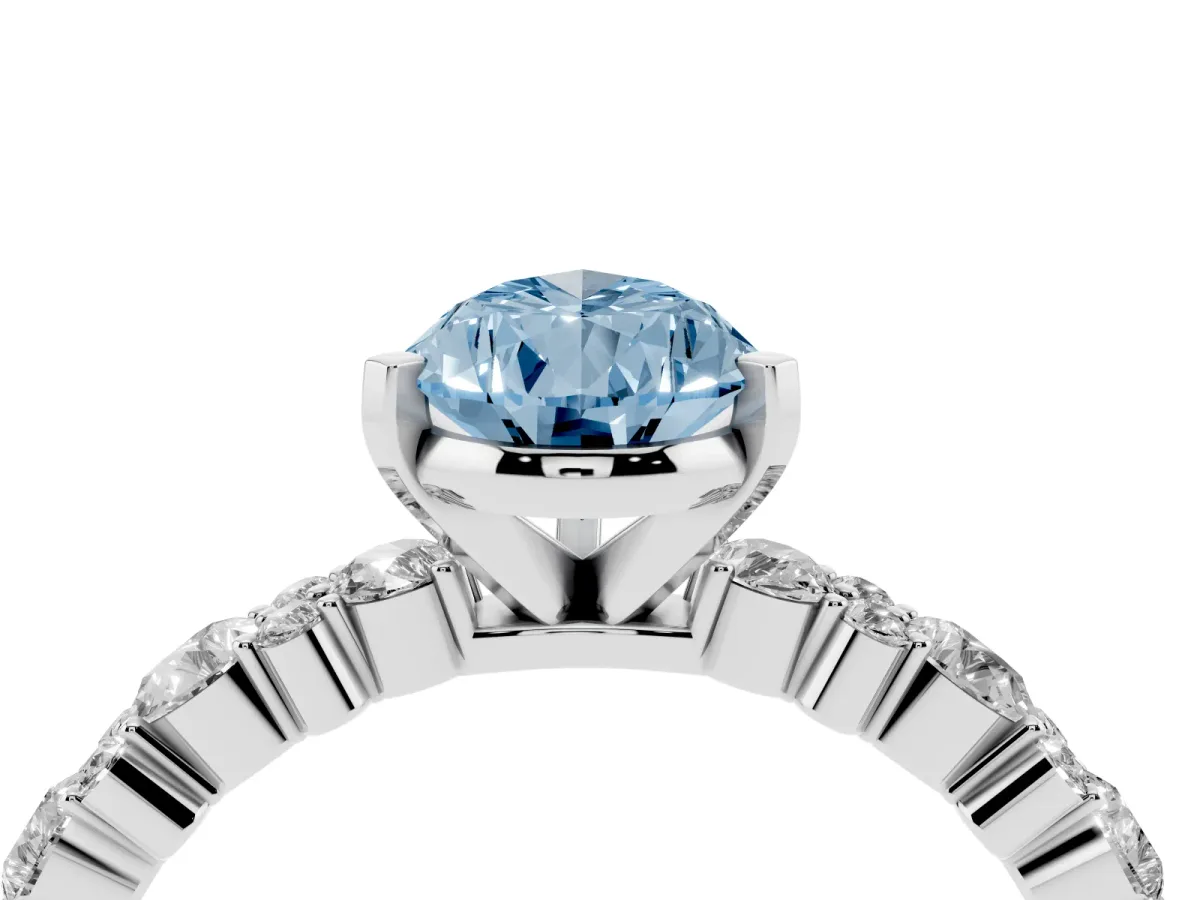 Fancy Blue Pear Cut Diamond Side Stone Solitaire Ring with Round and Four-Prong Setting White gold