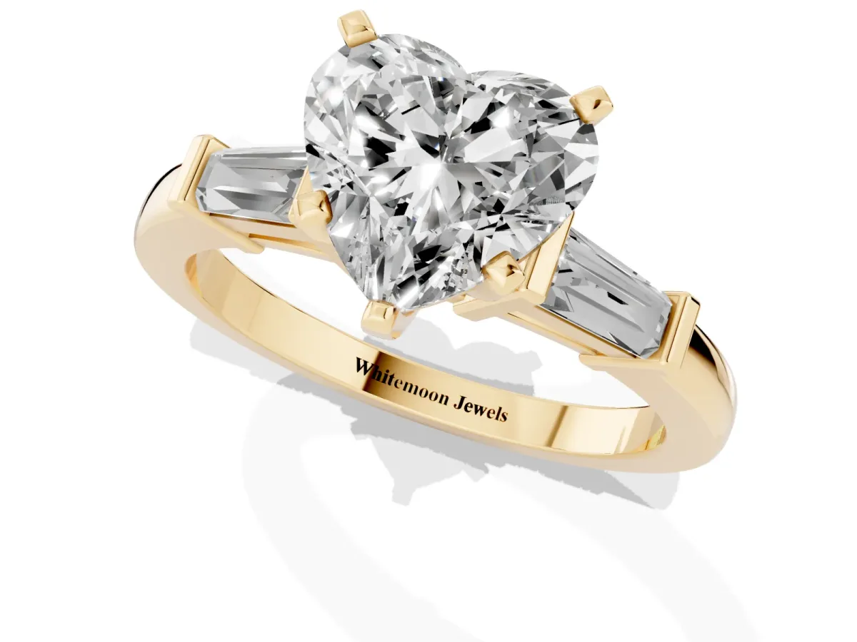 Heart Cut Cut Diamond Solitaire Ring with Tapered Baguette Accents and Four-Prong Setting Yellow gold