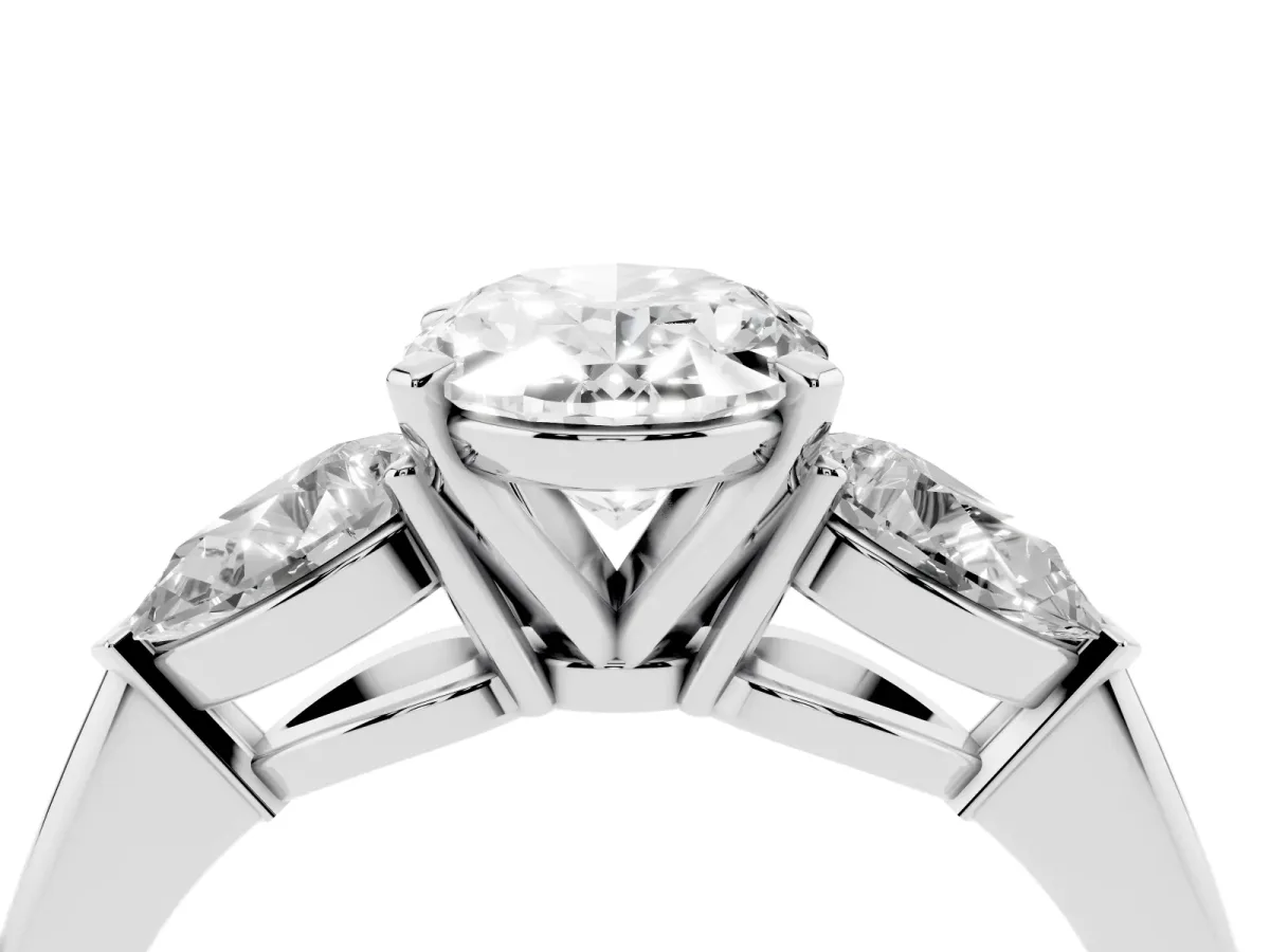 Three-Stone Oval Cut Diamond Ring with Pear Side Stones and Four-Prong Setting White gold