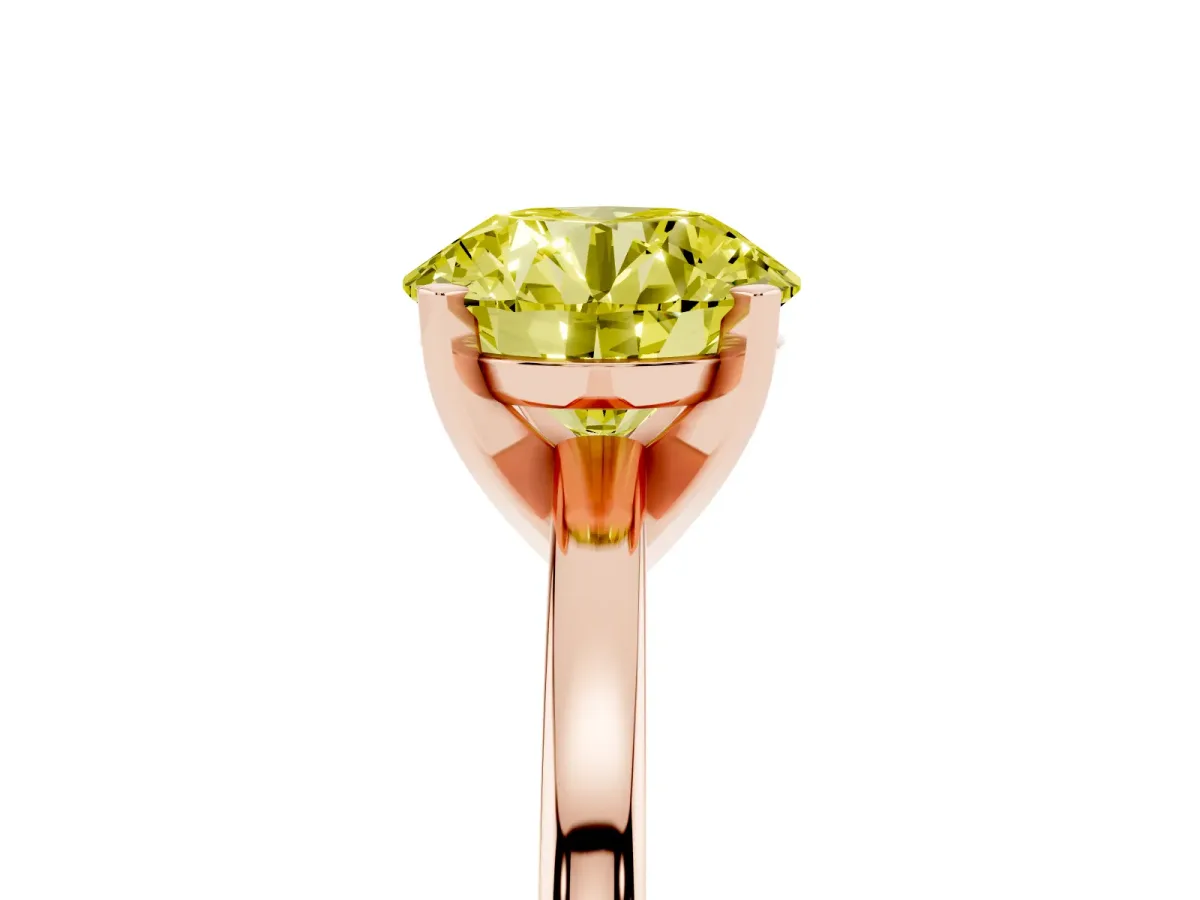 Fancy Yellow Round Cut Solitaire Diamond Engagement Ring with Four-Prong Setting on a Classic Band Rose gold