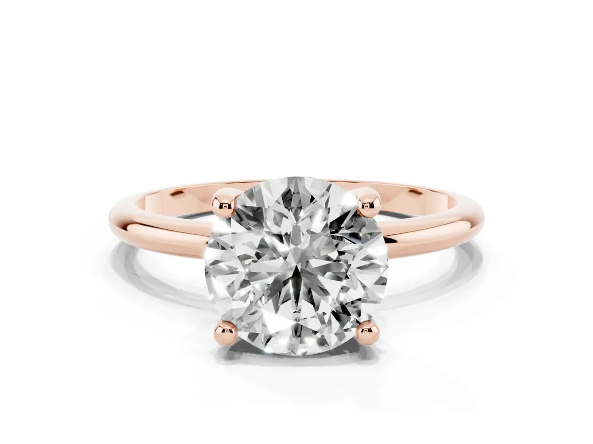Round Cut Solitaire Diamond Ring with 4-Prong Setting on a Classic Band Rose gold