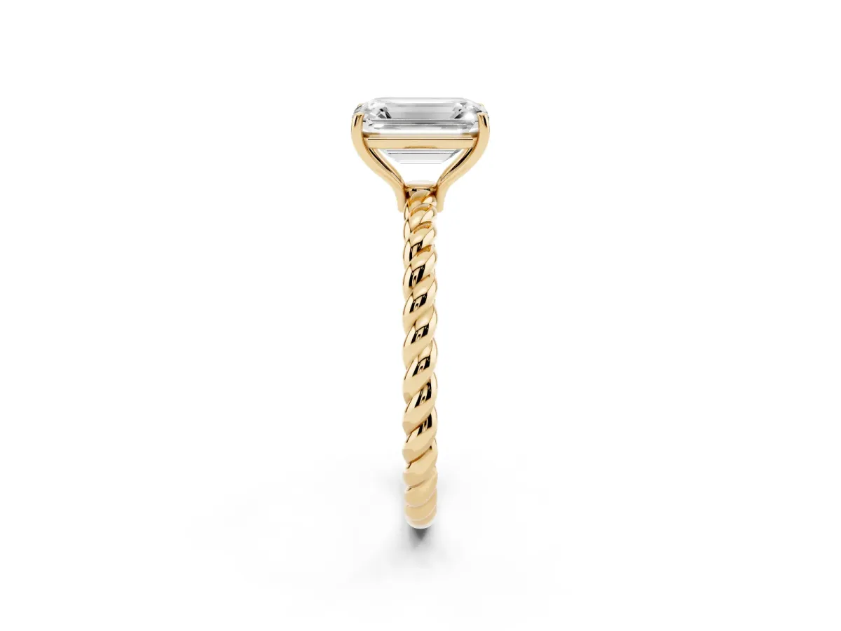 Emerald Cut Solitaire Twist Band Ring with Four-Prong Setting Yellow gold
