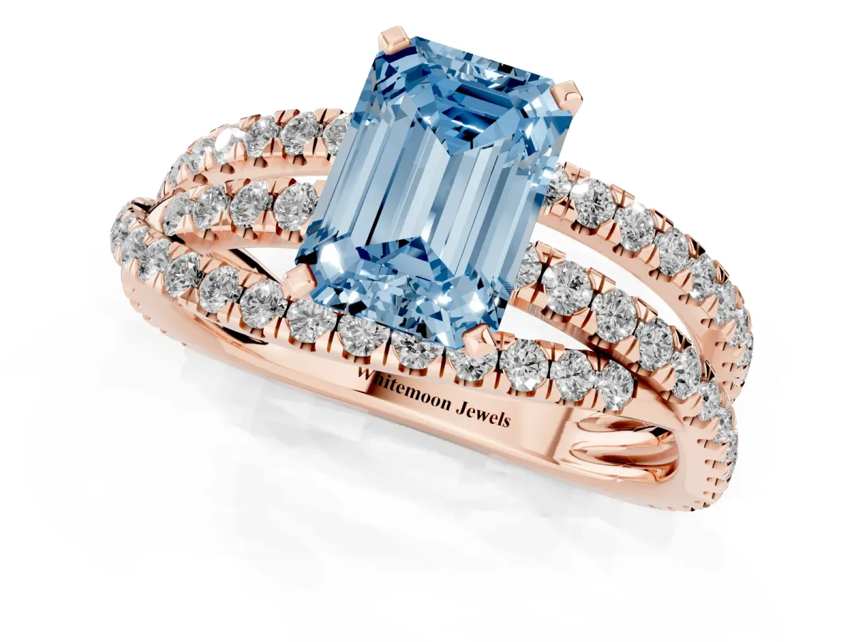 Fancy Blue Emerald Cut Solitaire Twist Band with Pavé Setting and Four-Prong Setting Rose gold