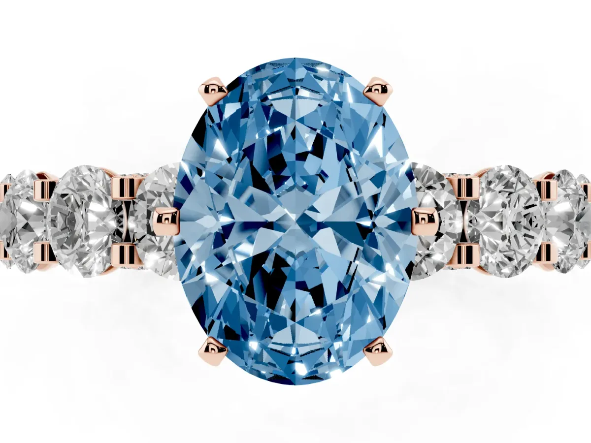 Fancy Blue Oval Cut Diamond Side Stone Engagement Ring with Four-Prong Setting Rose gold