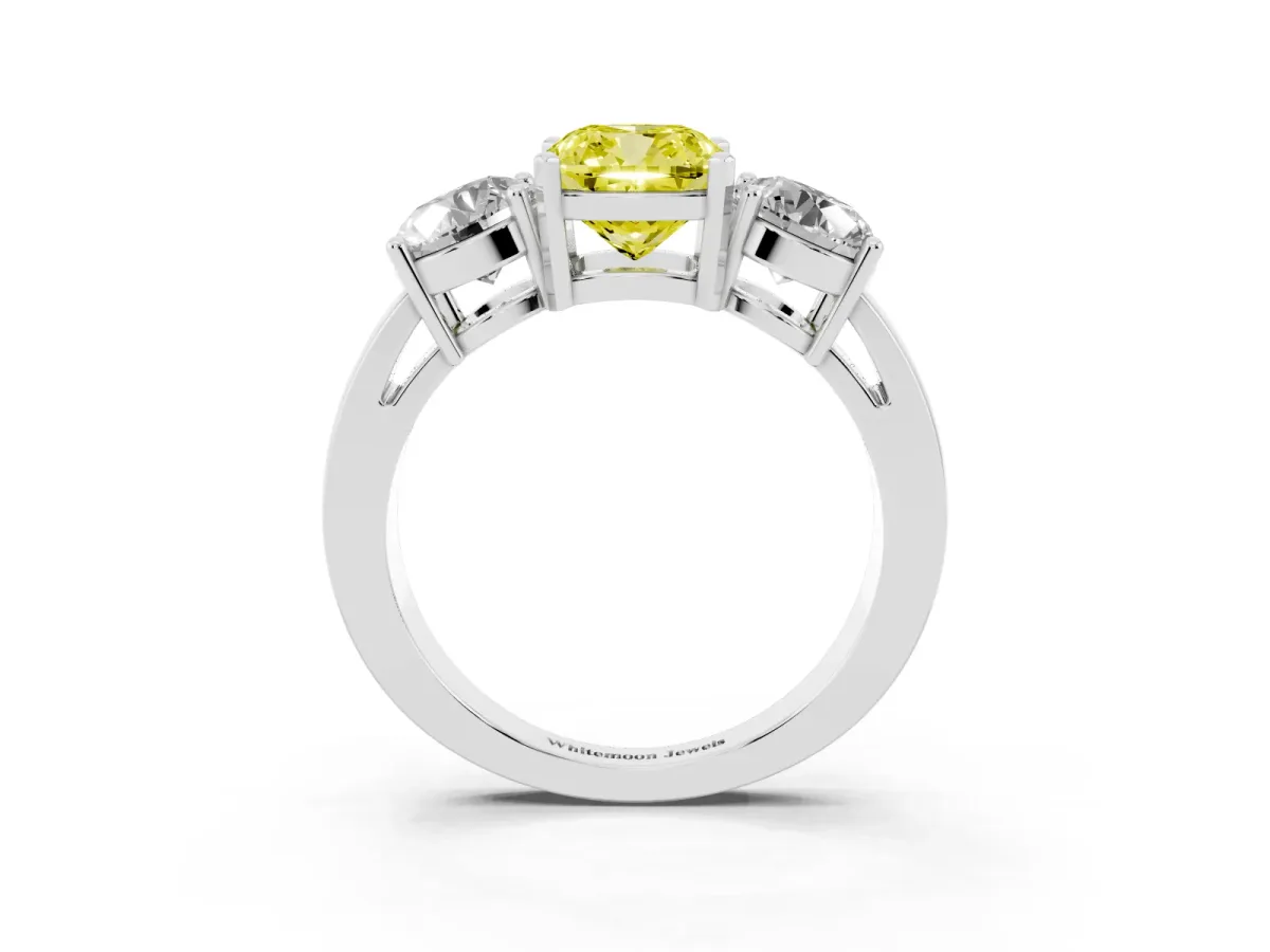 Fancy Yellow Three-Stone Cushion Cut Diamond Ring with Round Side Stones, Classic Band, and Four-Prong Setting Silver