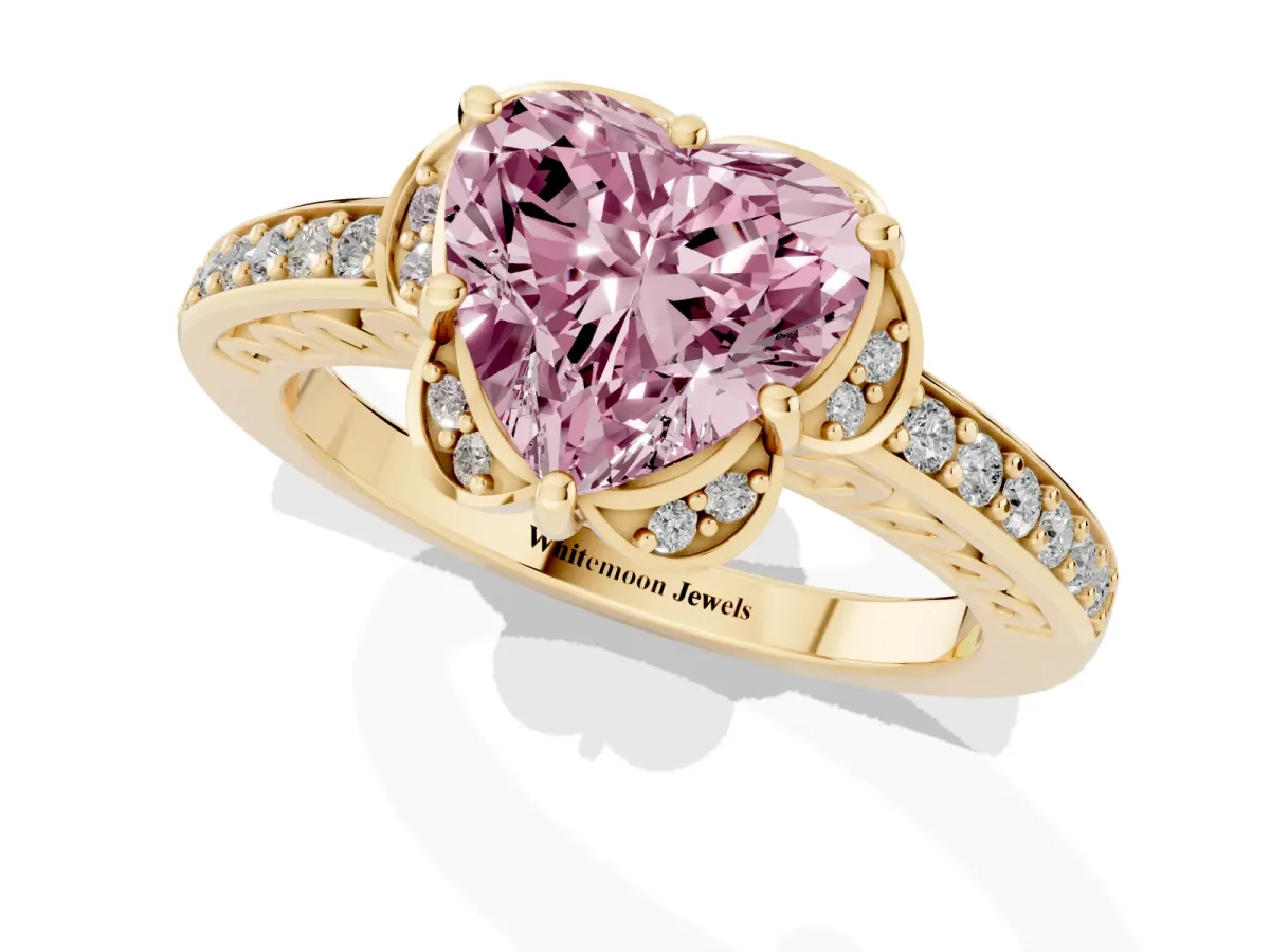 Fancy Pink Heart Cut Cut Halo Diamond Ring with Channel Set Band and Four-Prong Setting Yellow gold