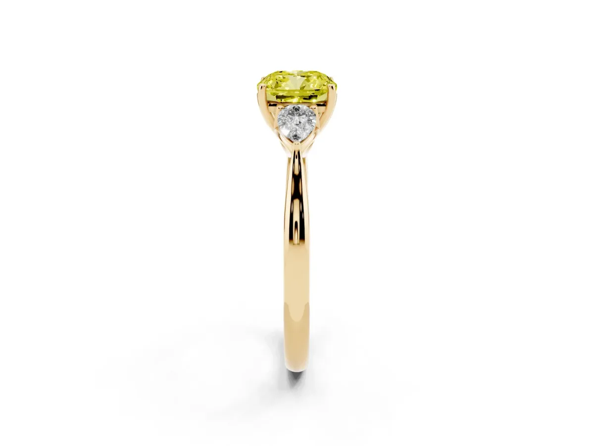 Fancy Yellow Cushion Cut Diamond Three-Stone Ring with Pear Side Stones and Prong Setting Yellow gold