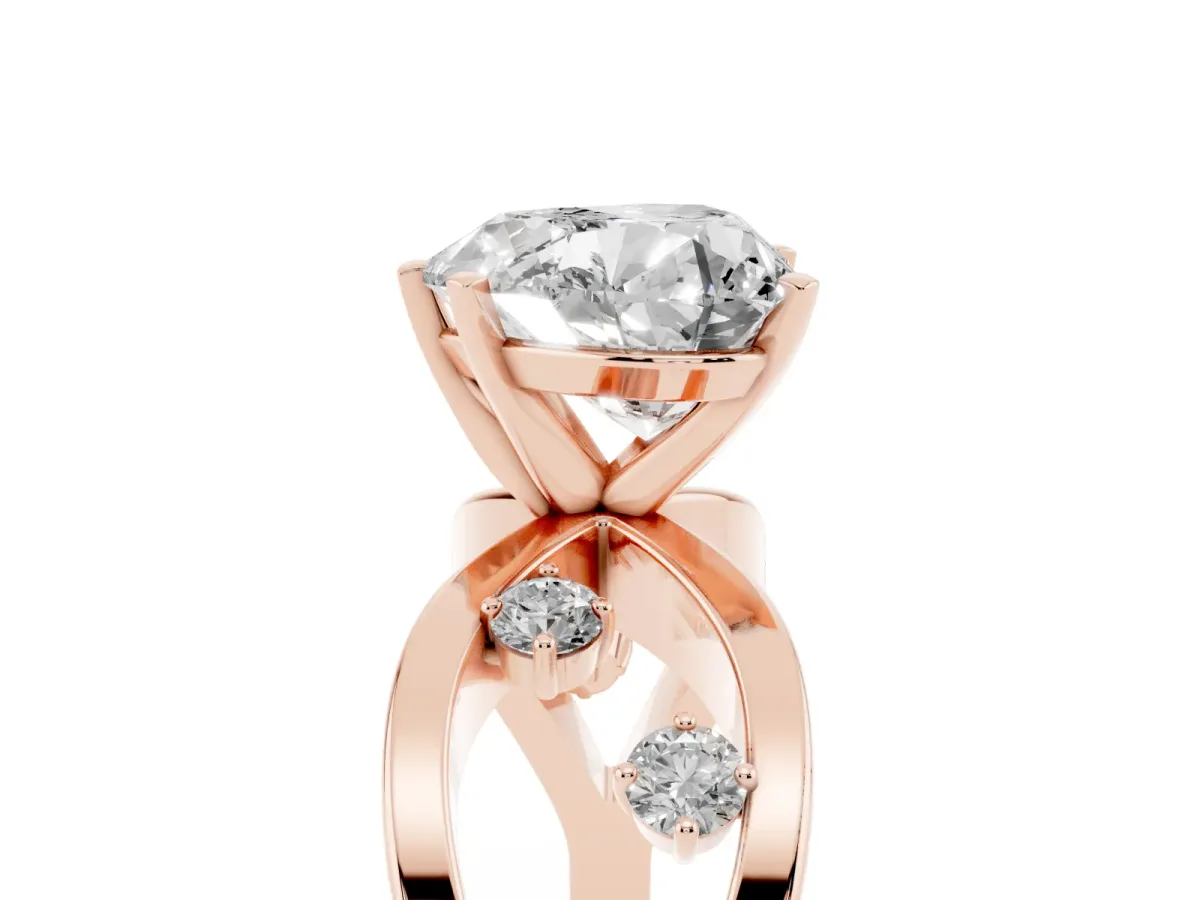 Heart Cut Cut Solitaire Diamond with Side Stones on Criss-Cross Band and Four-Prong Setting Rose gold