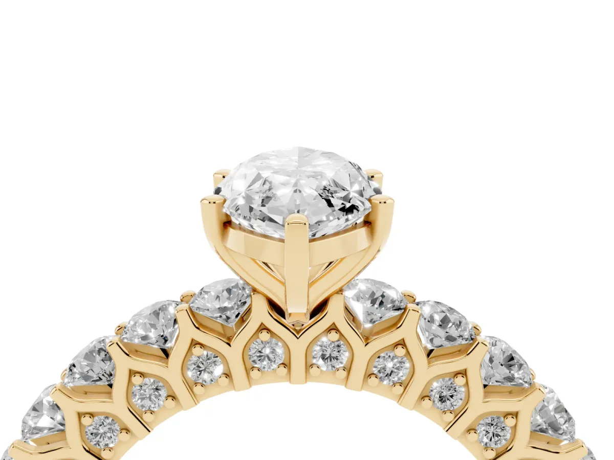 Marquise Cut Diamond Solitaire Ring with Shared Prong Pavé Band and Four-Prong Setting Yellow gold
