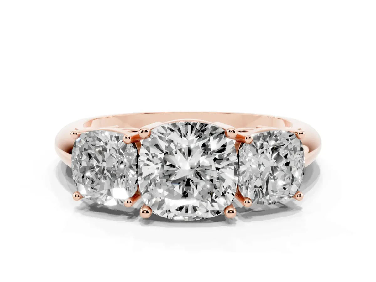 Three-Stone Cushion Cut Cut Diamond Engagement Ring with Prong Setting on a White Gold Band Rose gold