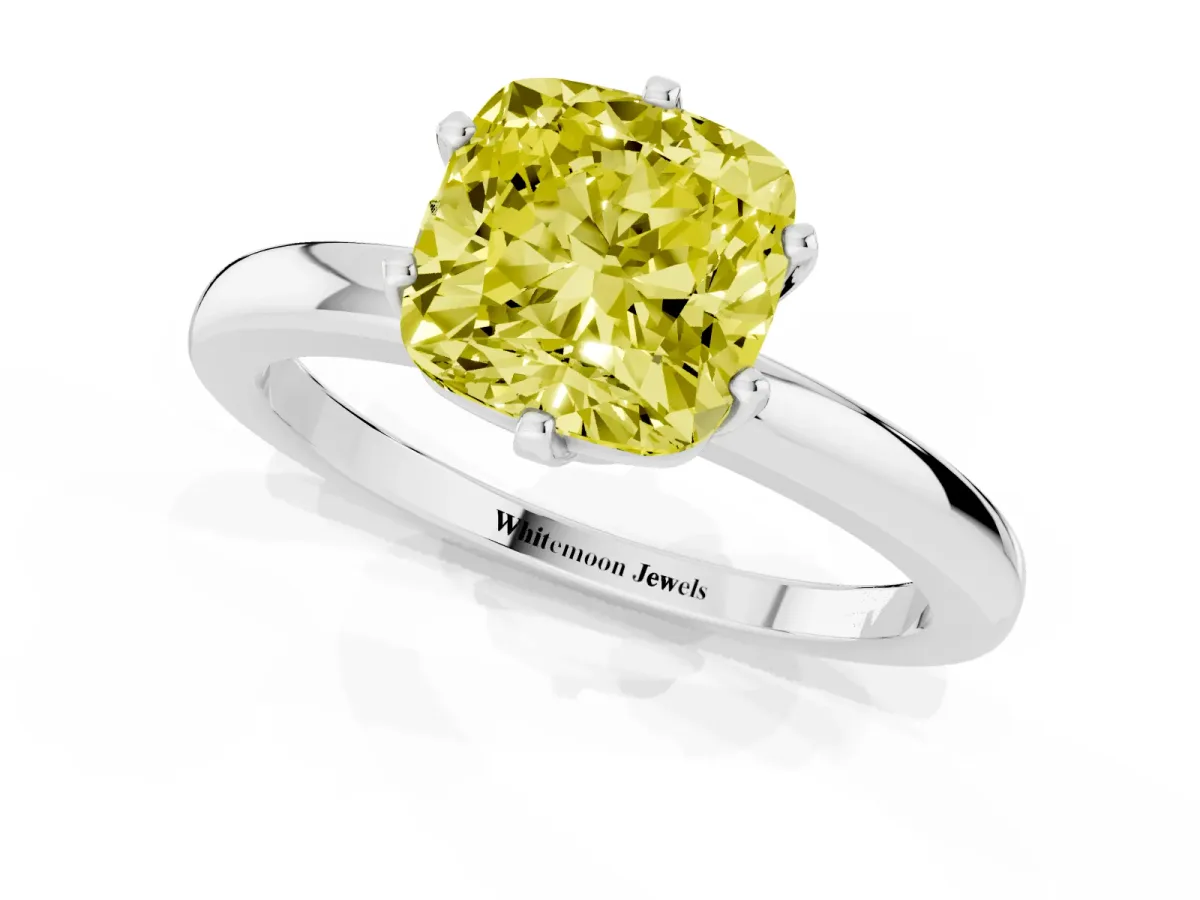 Fancy Yellow Cushion Cut Solitaire Diamond Ring with Six-Prong Setting on a Classic Band Silver