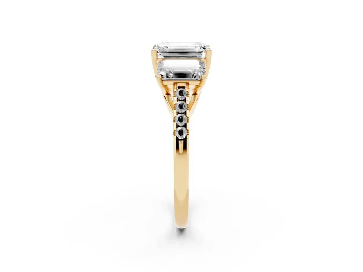 Three-Stone Emerald Cut Diamond Ring with Round Pavé Band and Prong Setting Yellow gold