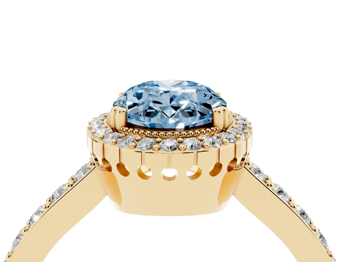 Fancy Blue Oval Cut Cut Diamond Halo Engagement Ring with Milgrain Detail and Pavé Band Yellow gold