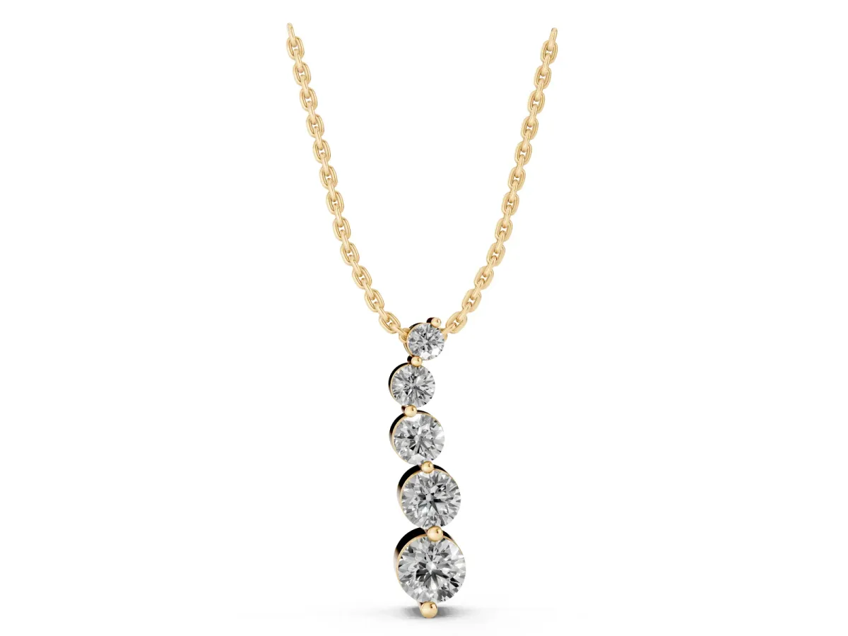 Graduated Round Diamond Prong Set Pendant Yellow gold
