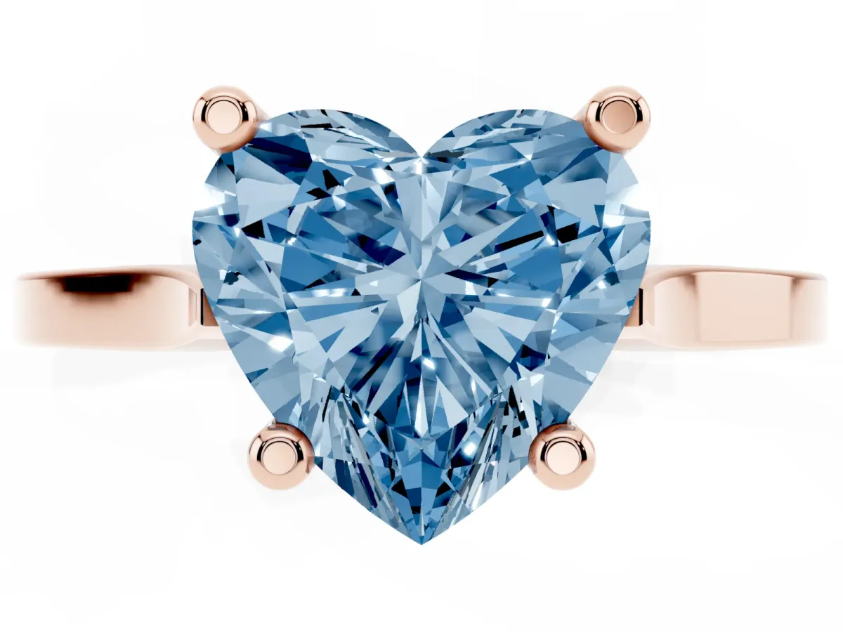Fancy Blue Heart Cut Solitaire Diamond Ring with Four-Prong Setting and Tapered Band Rose gold