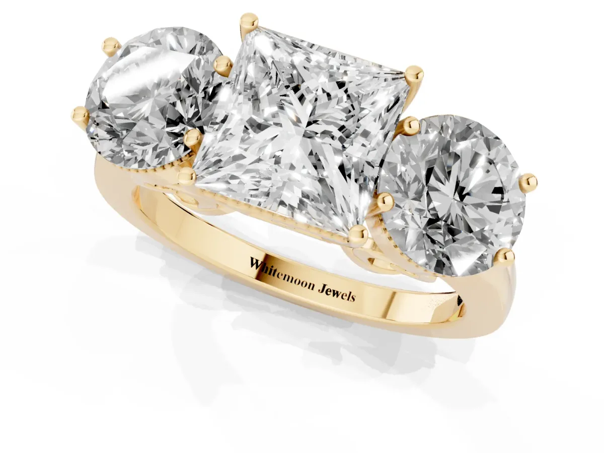 Three-Stone Princess Cut Diamond Engagement Ring with Prong Setting on a Classic Band Yellow gold