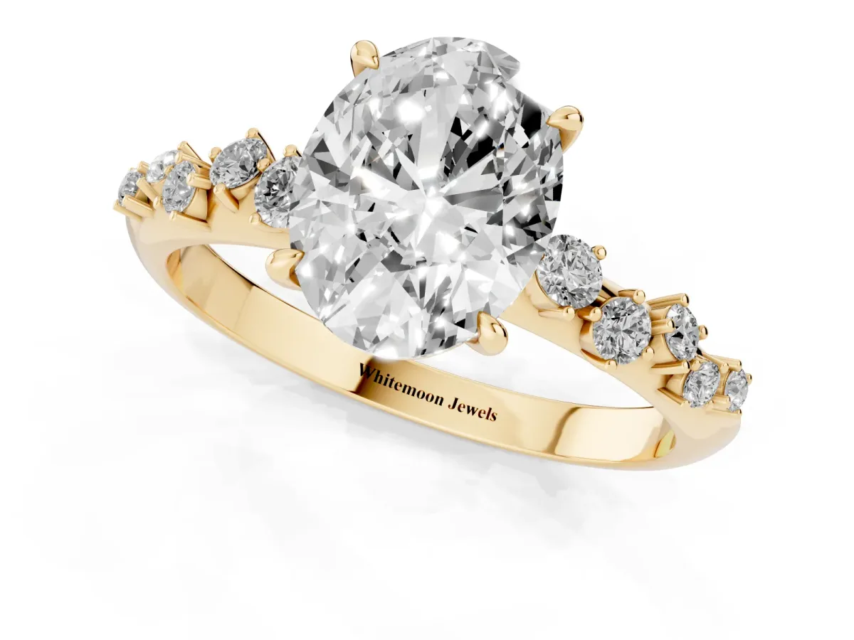 Oval Cut Diamond Cluster Side Stone Solitaire Ring with Prong Setting Yellow gold