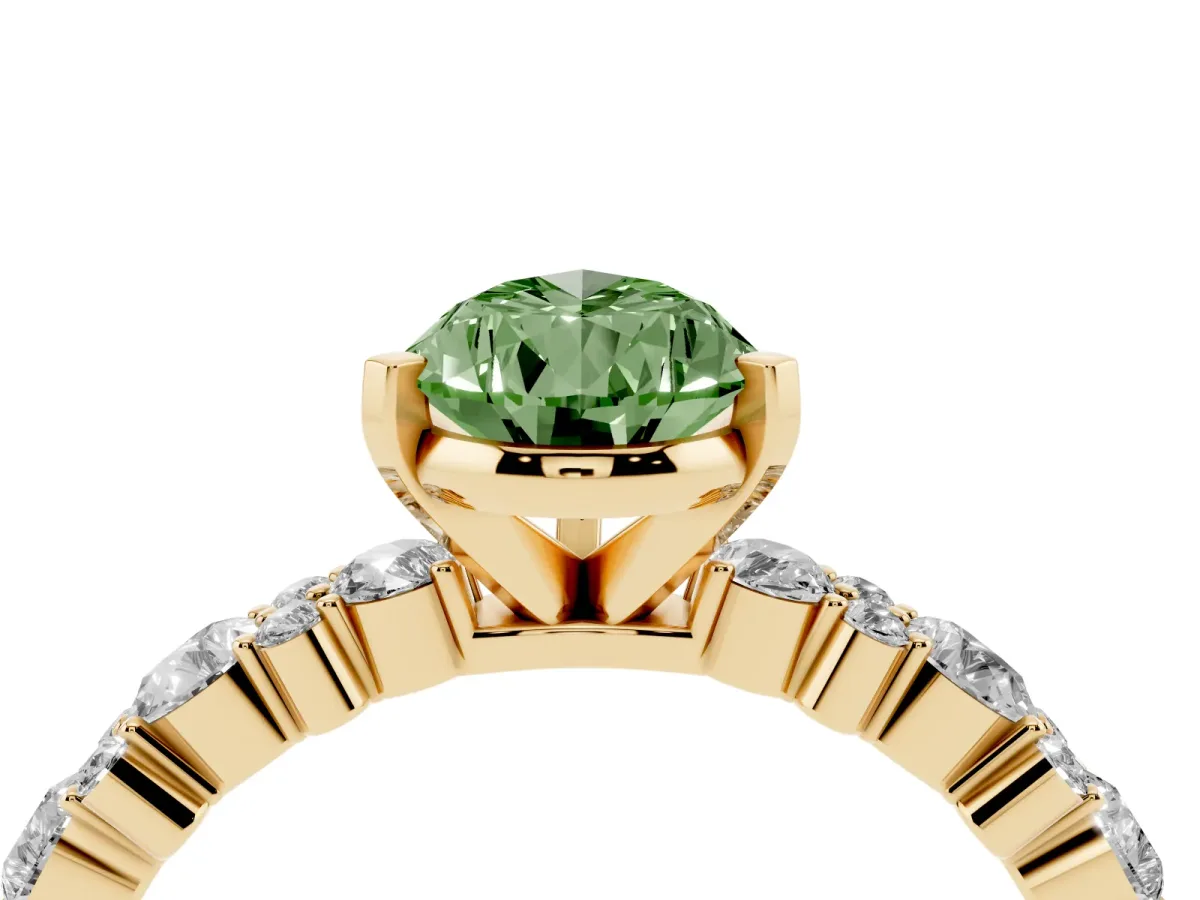 Fancy Green Pear Cut Diamond Side Stone Solitaire Ring with Round and Four-Prong Setting Yellow gold