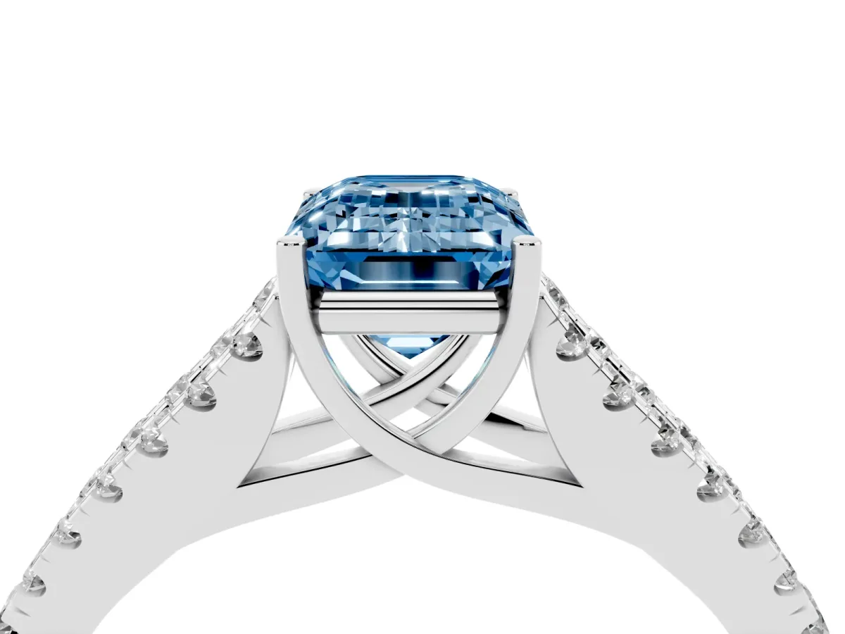 Fancy Blue Emerald Cut Diamond Split Shank Pavé Engagement Ring with Four-Prong Setting Silver