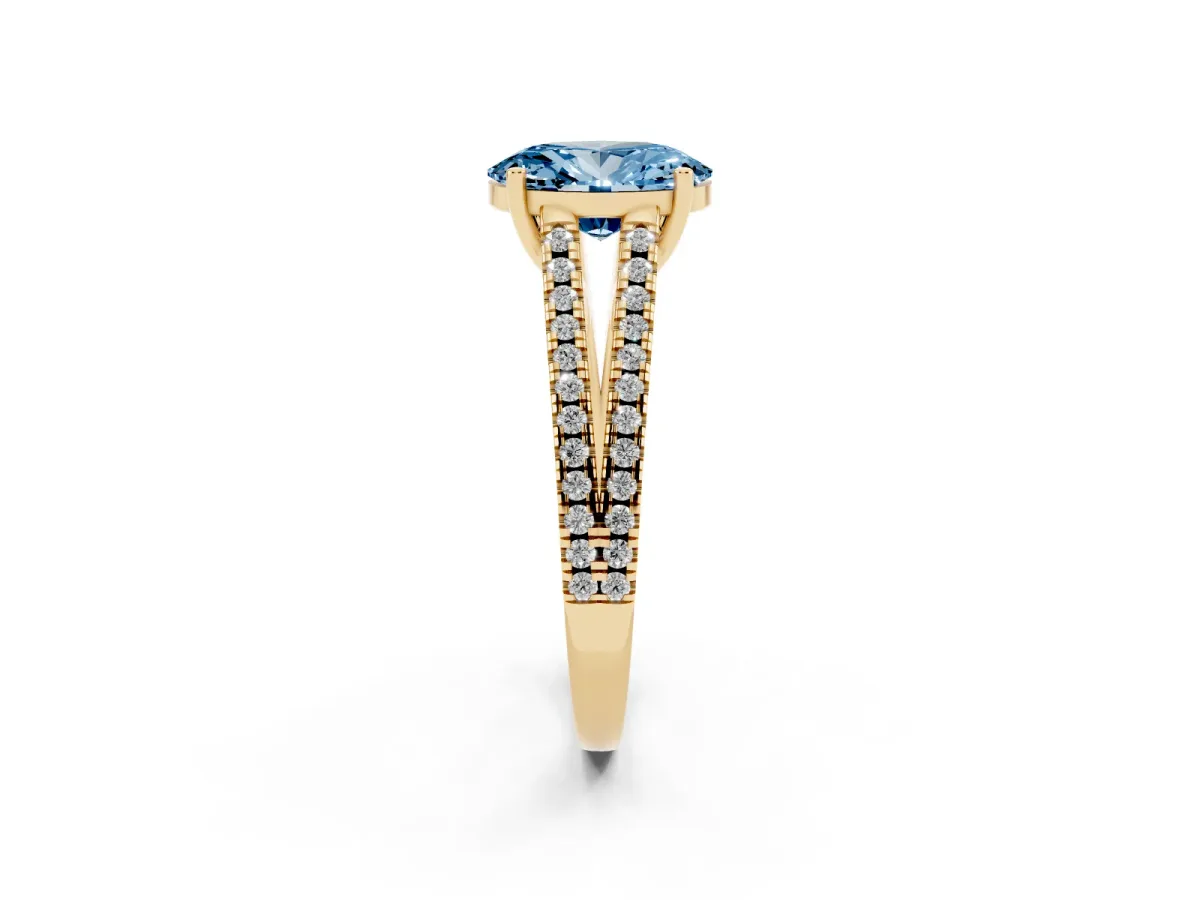 Fancy Blue Oval Cut Diamond Solitaire Engagement Ring with Split Shank Pavé Band Yellow gold