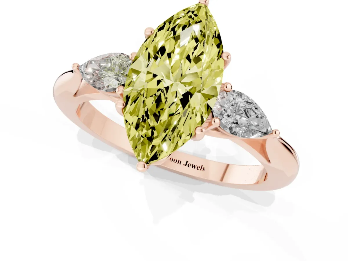 Fancy Yellow Three-Stone Marquise Cut Diamond Ring with Pear Side Stones in Four-Prong Setting Rose gold