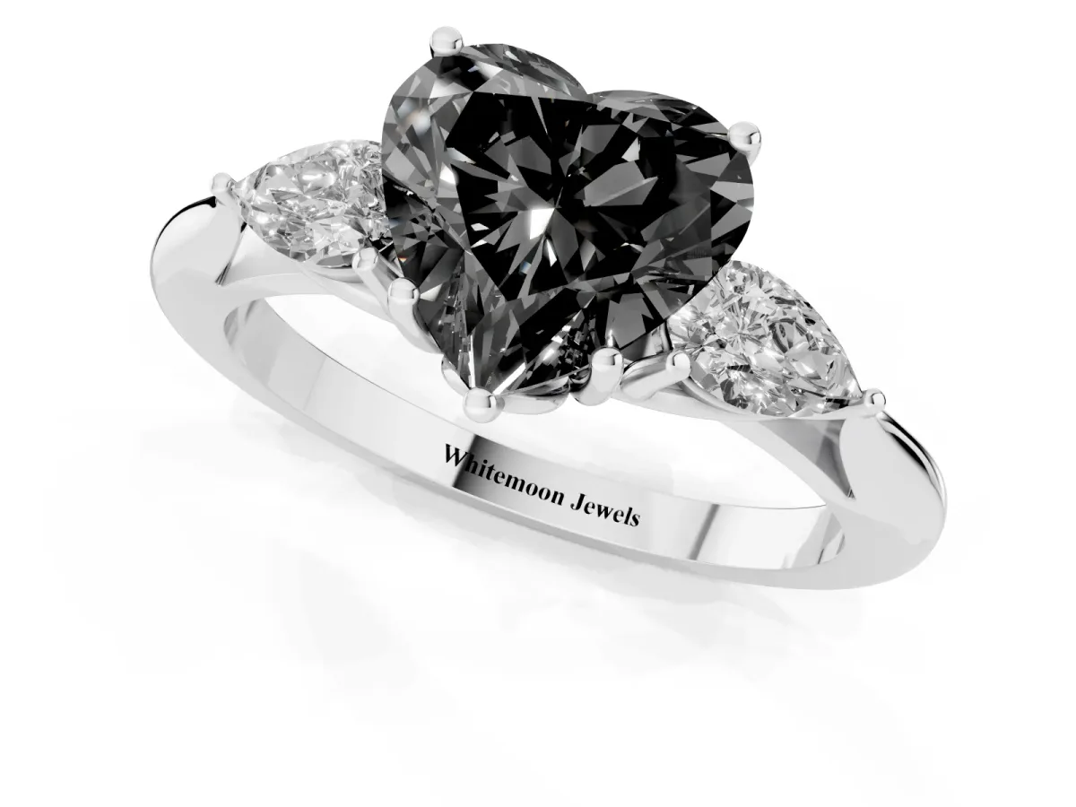 Fancy Black Three-Stone Heart Cut Brilliant Diamond Solitaire Ring with Tapered Band and Four-Prong Setting Silver