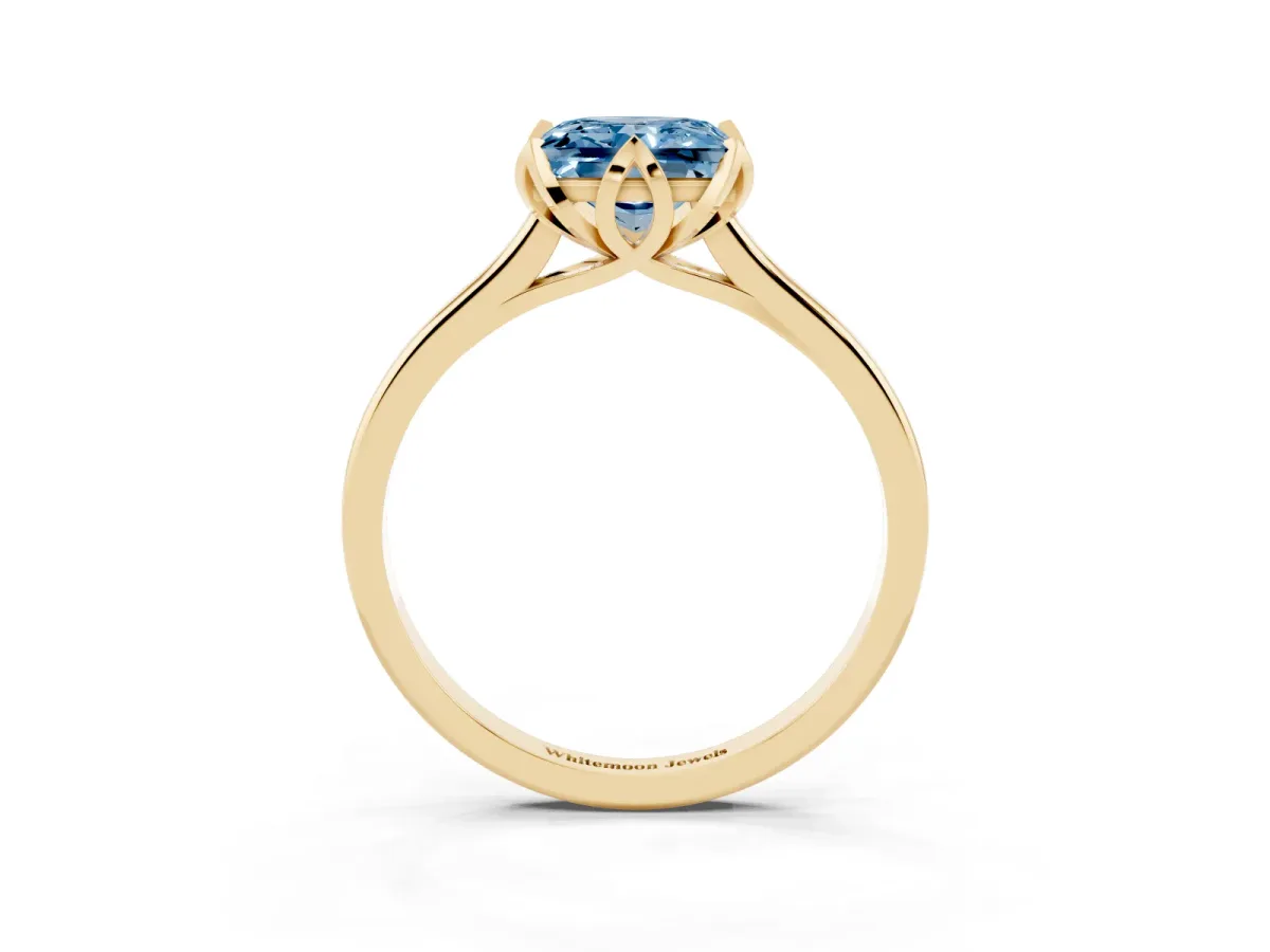 Fancy Blue Princess Cut Diamond Solitaire Ring with Flower Prong Setting and Classic Band Yellow gold