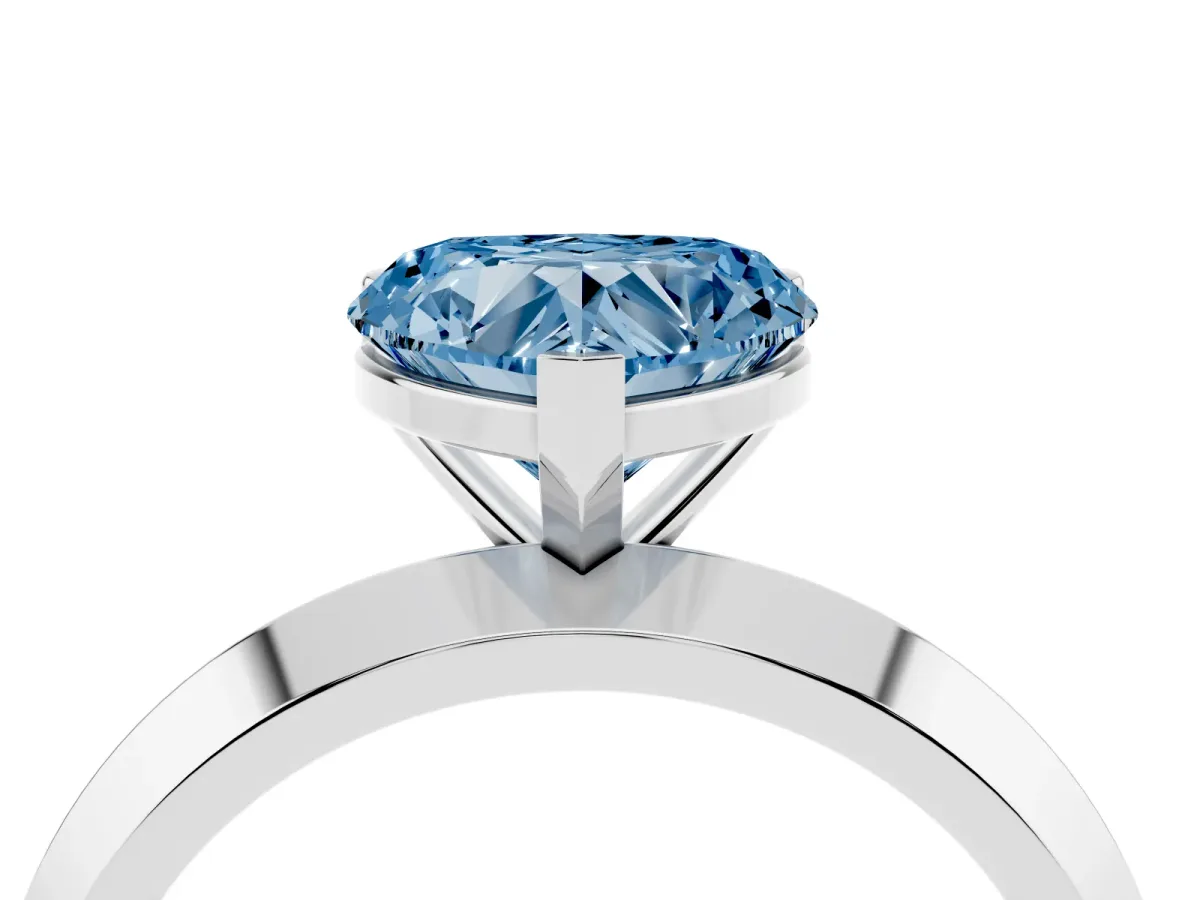 Fancy Blue Heart Cut Cut Solitaire Engagement Ring with Flat Band and Four-Prong Setting Silver