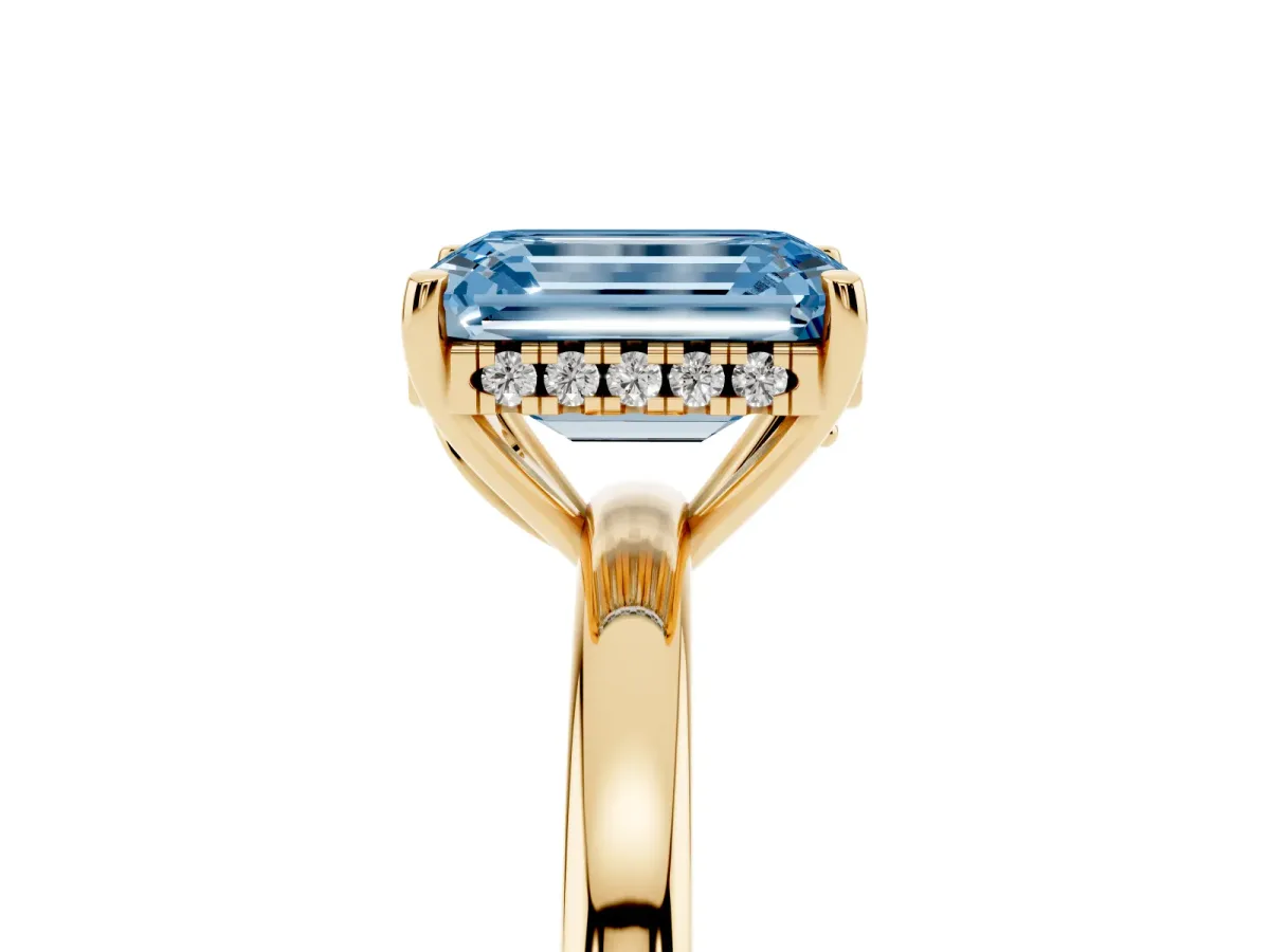 Fancy Blue Emerald Cut Solitaire Diamond Ring with Prong Setting and Plain Band Yellow gold