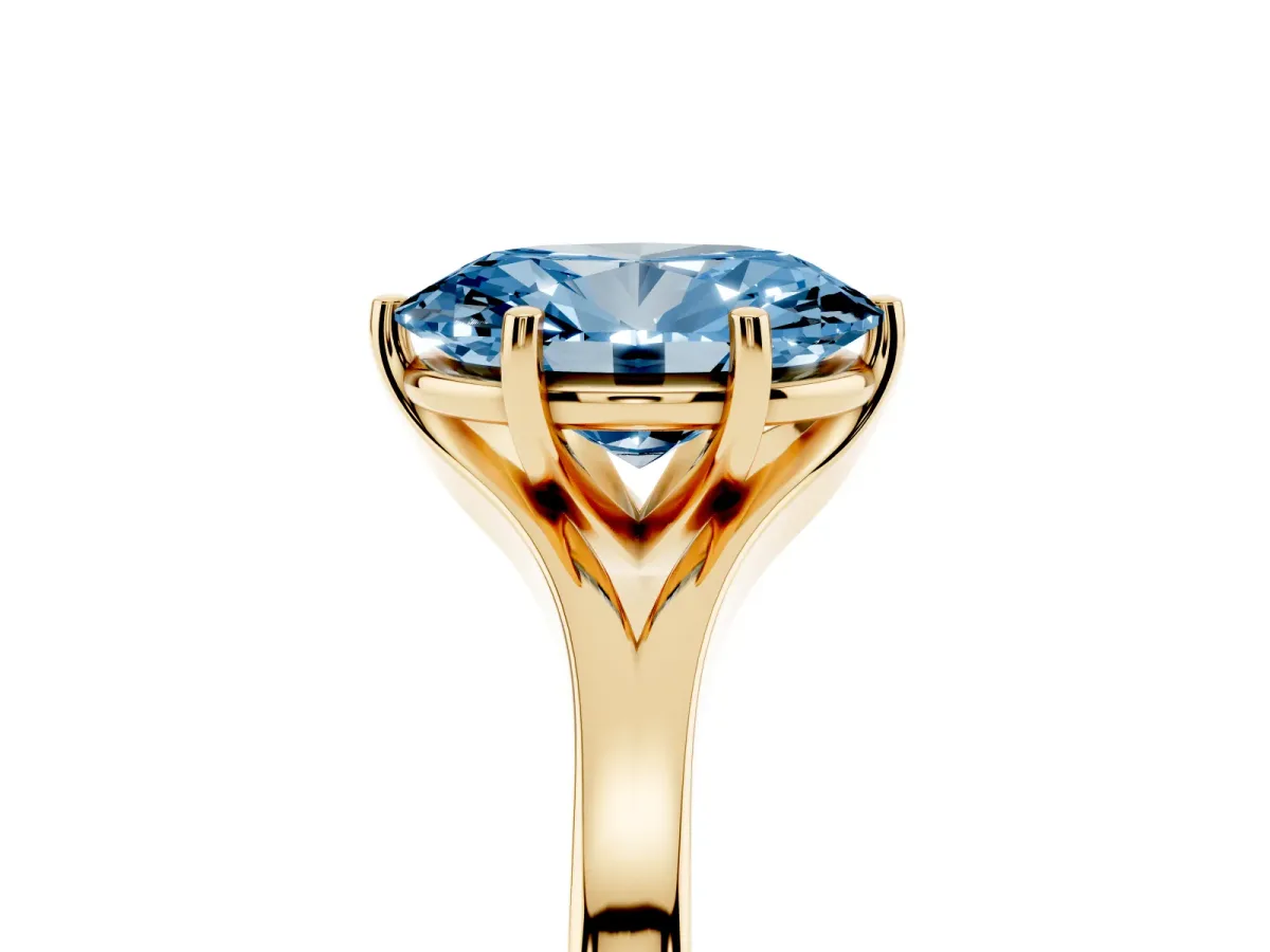 Fancy Blue Oval Cut Solitaire Diamond Ring with Six-Prong Setting and Tapered Band Yellow gold