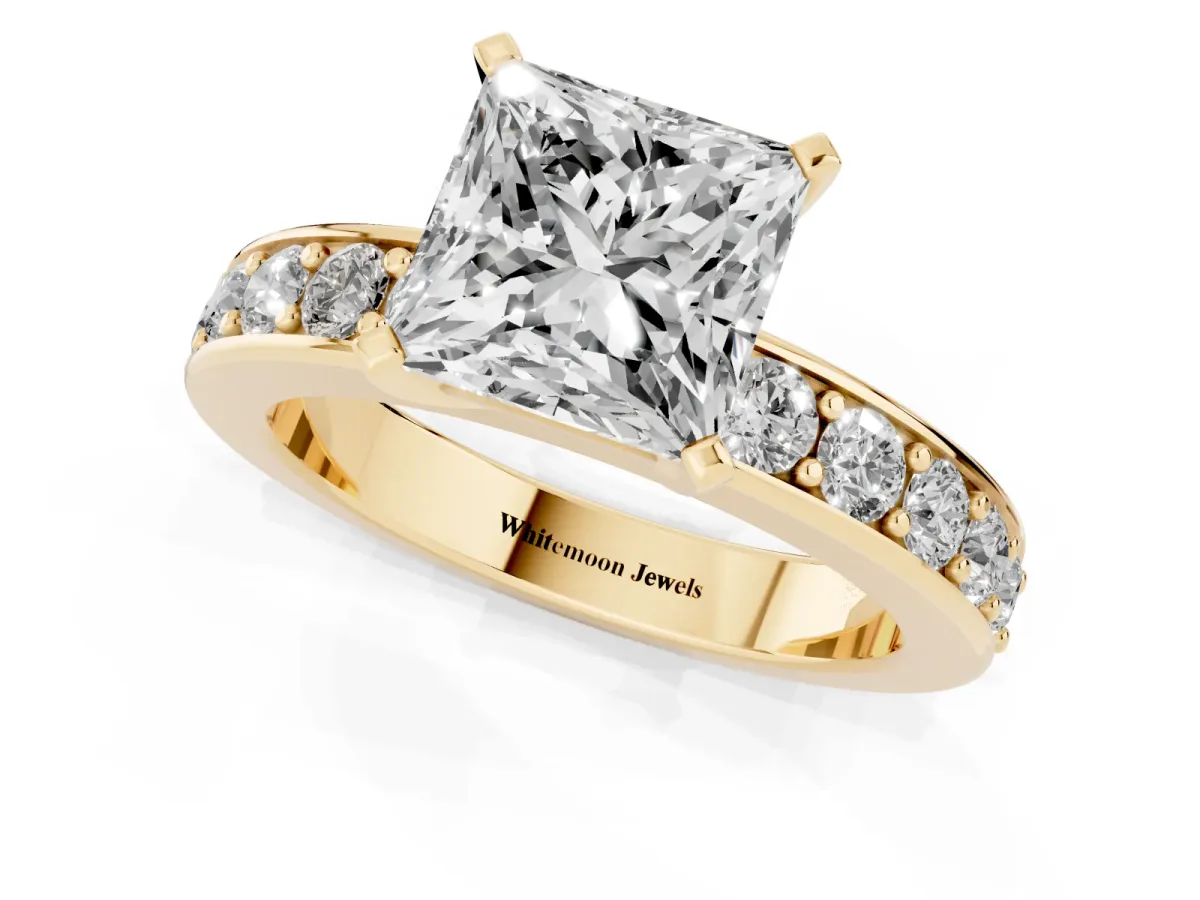 Princess Cut Diamond Engagement Ring with Channel Set Round Band and Prong Setting Yellow gold