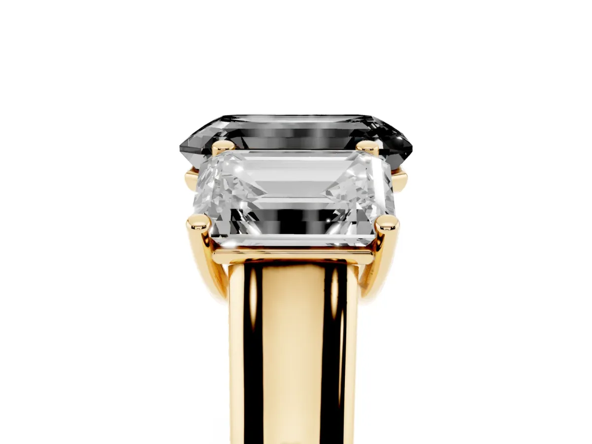 Fancy Black Emerald Cut Three-Stone Diamond Ring with Prong Setting on a Classic Band Yellow gold