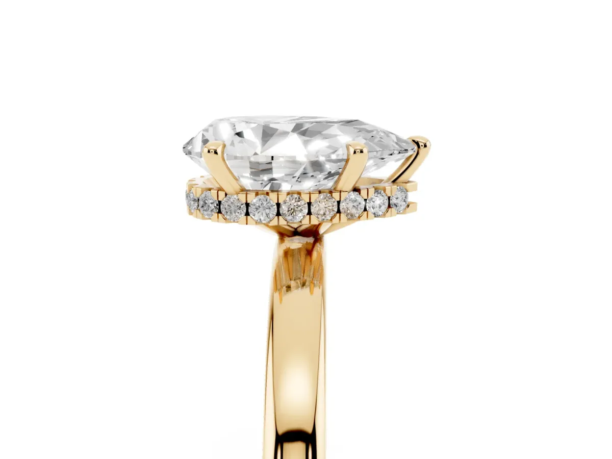 Pear Cut Solitaire Engagement Ring with Cathedral Band and Four-Prong Setting Yellow gold