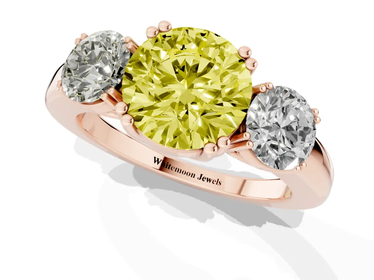 Fancy Yellow Three-Stone Round Cut Cut Diamond Ring with Channel Set Band and Four-Prong Setting Rose gold