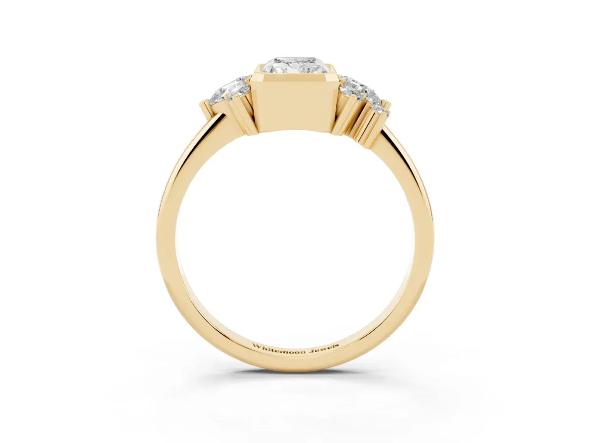 Radiant Diamond Engagement Ring with Pear and Round Side Stones Yellow gold