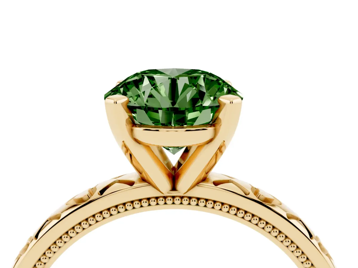 Fancy Green Round Cut Solitaire Diamond Engagement Ring with XO Engraved Band and Four-Prong Setting Yellow gold