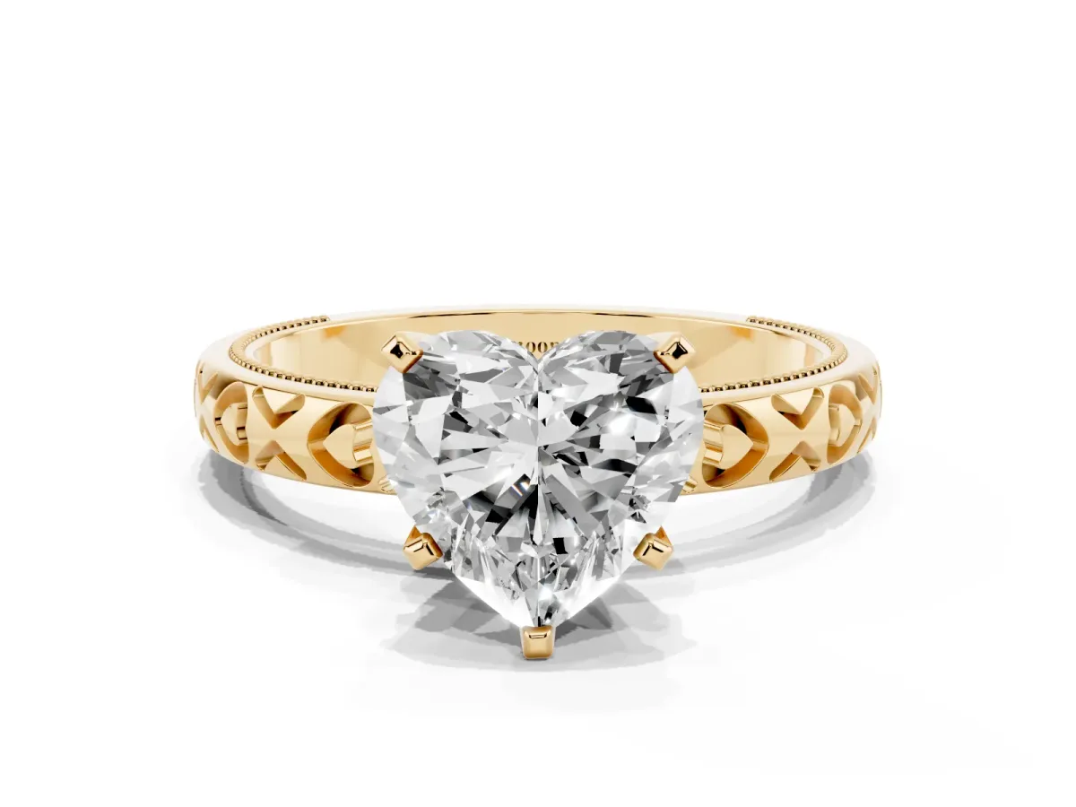 Heart Cut Solitaire Diamond Engagement Ring with XO Engraved Band and Four-Prong Setting Yellow gold