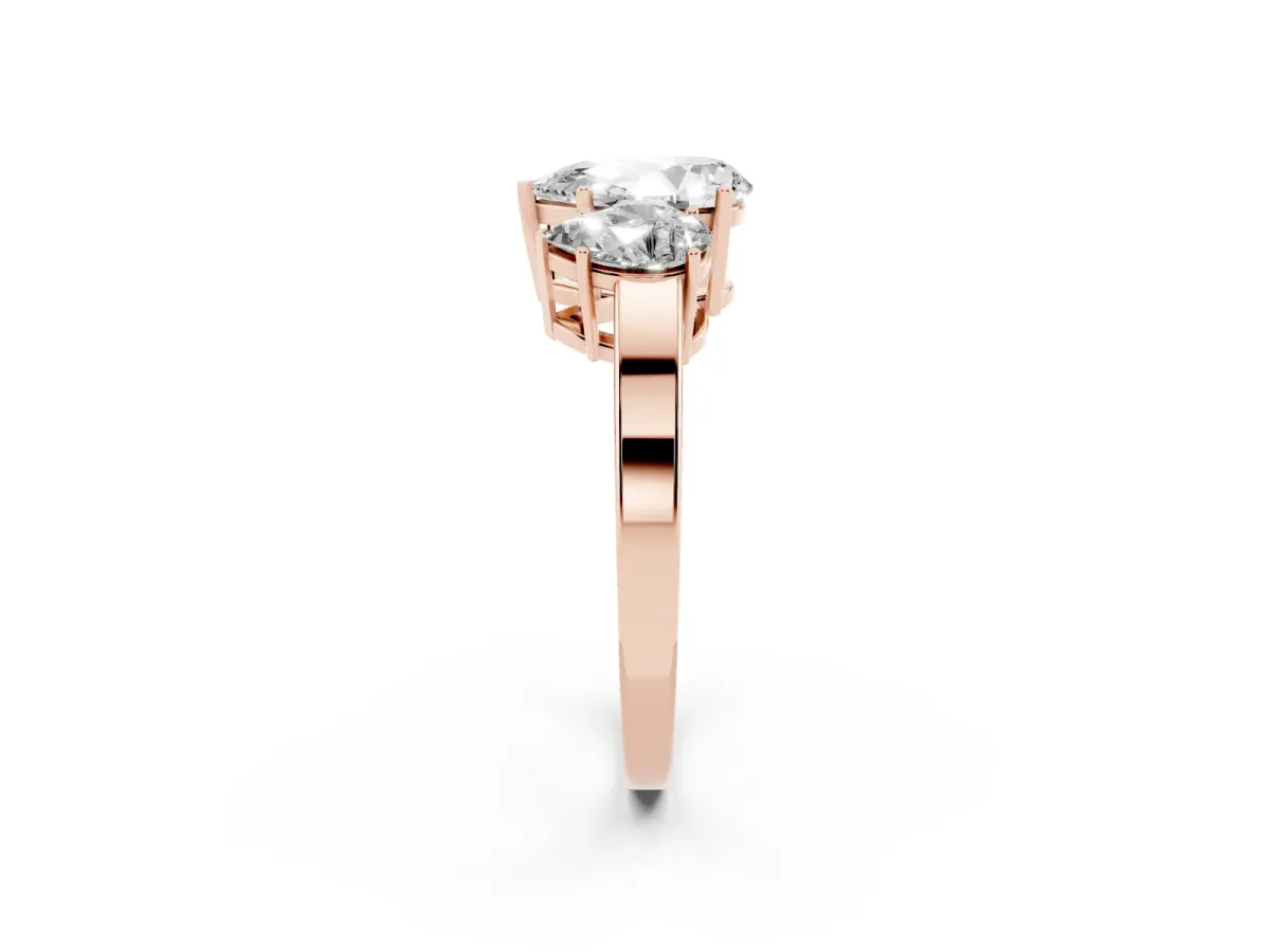 Three-Stone Pear Cut Cut Diamond Engagement Ring with Flat Band and Four-Prong Setting Rose gold